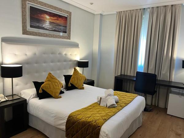 Hotel Suites Feria de Madrid : photo 2 de la chambre chambre lit queen-size 