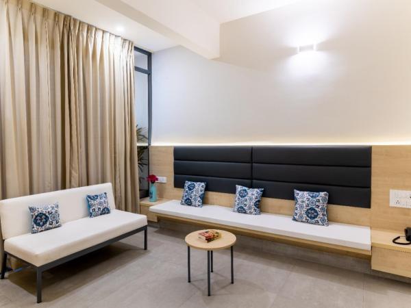 Iris Suites : photo 3 de la chambre chambre deluxe