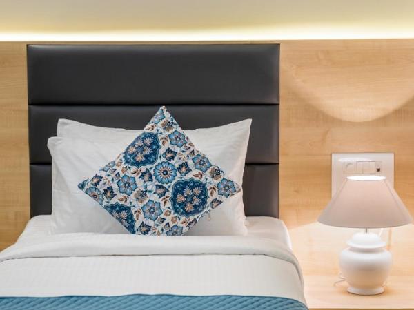 Iris Suites : photo 2 de la chambre chambre deluxe