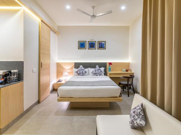 Iris Suites : photo 6 de la chambre chambre deluxe