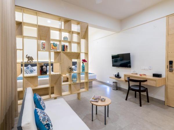 Iris Suites : photo 4 de la chambre chambre triple deluxe