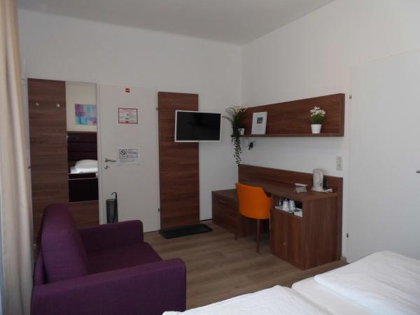 Pension Elisabeth - Rooms & Apartments : photo 4 de la chambre chambre lits jumeaux supérieure