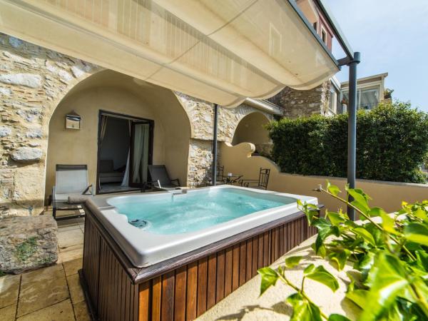 Hotel Metropole Taormina : photo 1 de la chambre chambre double deluxe avec terrasse et piscine