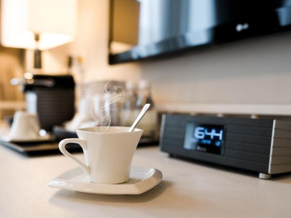 Hotel NuVe Heritage : photo 4 de la chambre hébergement lit queen-size pittoresque