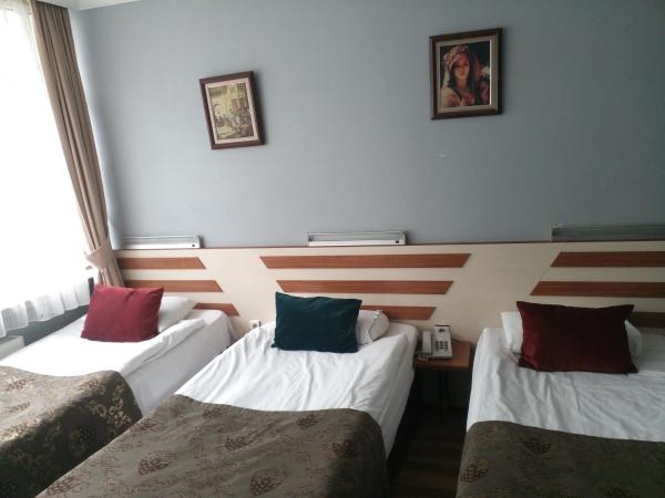 Tac Hotel : photo 1 de la chambre chambre triple