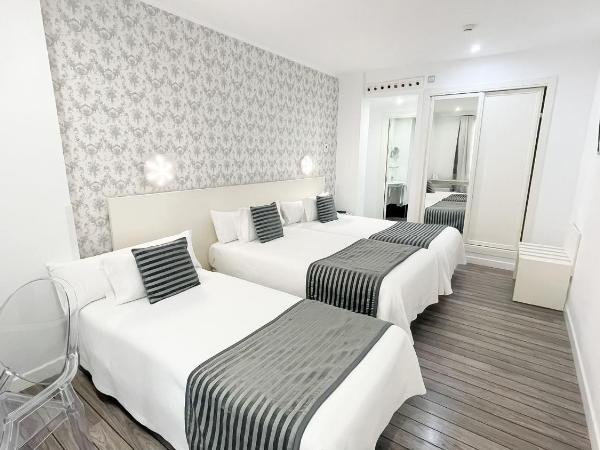 La Boutique Puerta Osario : photo 2 de la chambre chambre double avec lit d'appoint (2 adultes + 1 enfant)