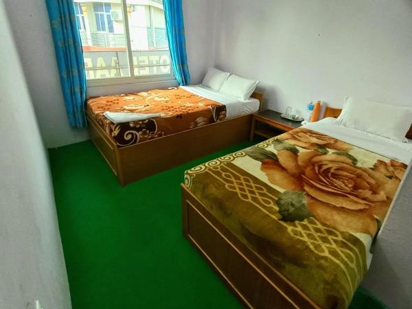 Hotel Aarjan And Restaurant : photo 2 de la chambre chambre double ou lits jumeaux deluxe avec balcon