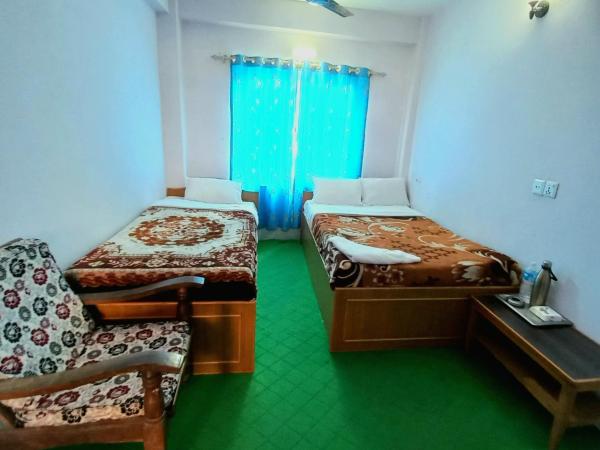 Hotel Aarjan And Restaurant : photo 2 de la chambre chambre deluxe double ou lits jumeaux