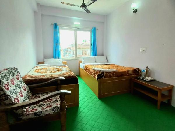 Hotel Aarjan And Restaurant : photo 1 de la chambre chambre deluxe double ou lits jumeaux