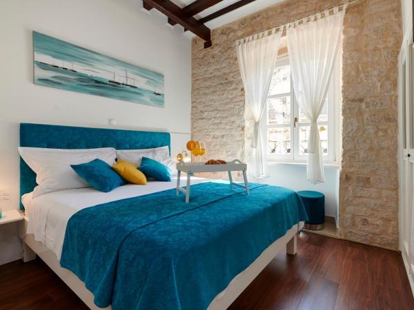 Palace Central Square : photo 1 de la chambre chambre lit king-size