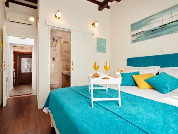 Palace Central Square : photo 3 de la chambre chambre lit king-size