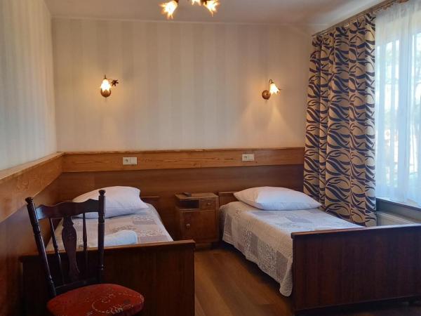 Dworek staropolski : photo 1 de la chambre chambre triple