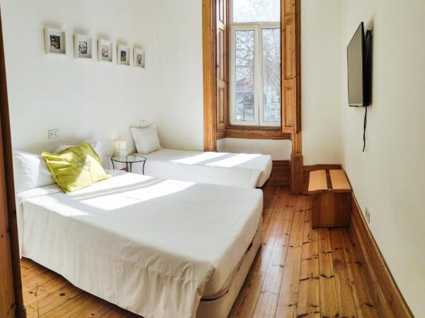 Casa da Praça Square Suites : photo 3 de la chambre appartement - vue sur jardin