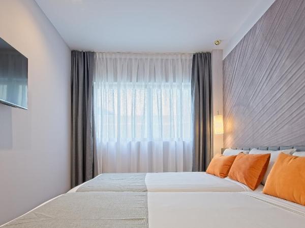 DWO Yuste Alcalá : photo 3 de la chambre chambre double familiale