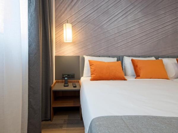 DWO Yuste Alcalá : photo 1 de la chambre chambre double familiale