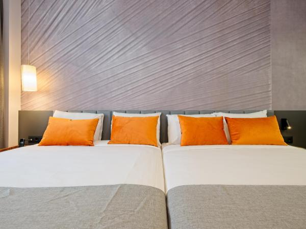 DWO Yuste Alcalá : photo 5 de la chambre chambre double familiale