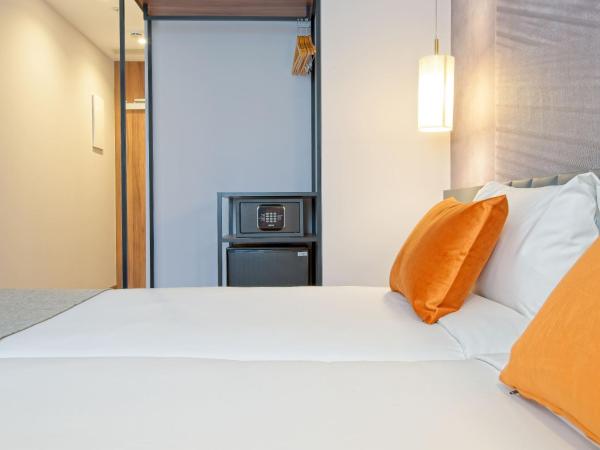 DWO Yuste Alcalá : photo 4 de la chambre chambre lits jumeaux