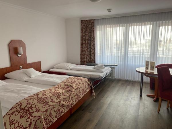 Apartment-Hotel Hamburg Mitte : photo 5 de la chambre chambre double avec canapé-lit