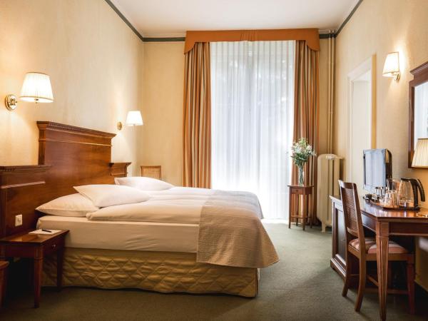 Hotel Reine Victoria by Laudinella : photo 3 de la chambre chambre triple Économique