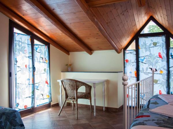 Le Coccole : photo 2 de la chambre chambre triple classique
