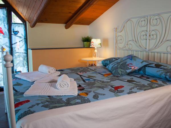 Le Coccole : photo 4 de la chambre chambre double