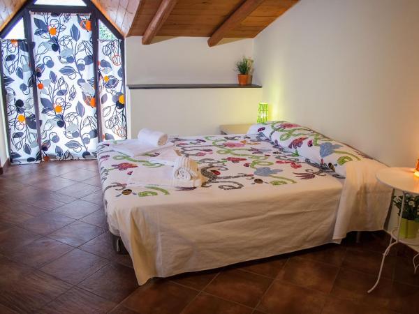 Le Coccole : photo 9 de la chambre chambre triple classique