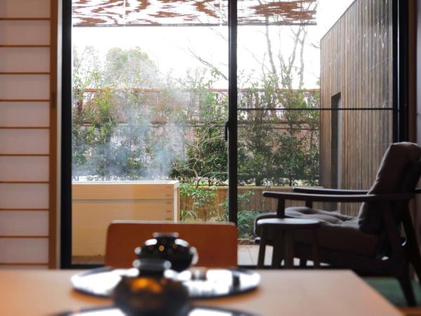 Negiya Ryofukaku : photo 1 de la chambre chambre lits jumeaux deluxe avec coin tatami et baignoire en plein air - non-fumeurs