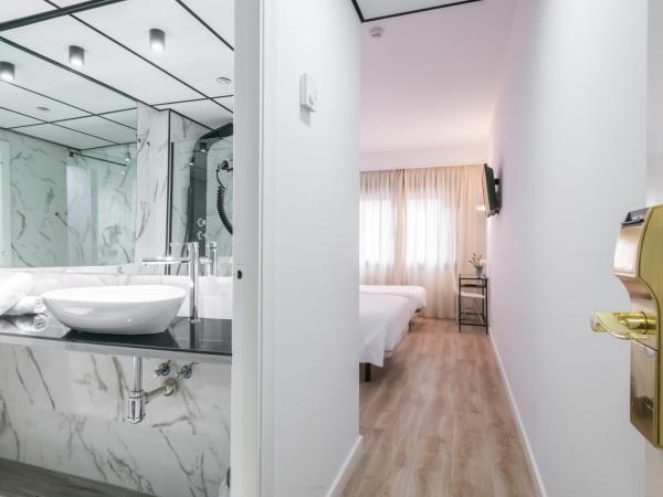 Hotel Sansi Park : photo 4 de la chambre chambre triple