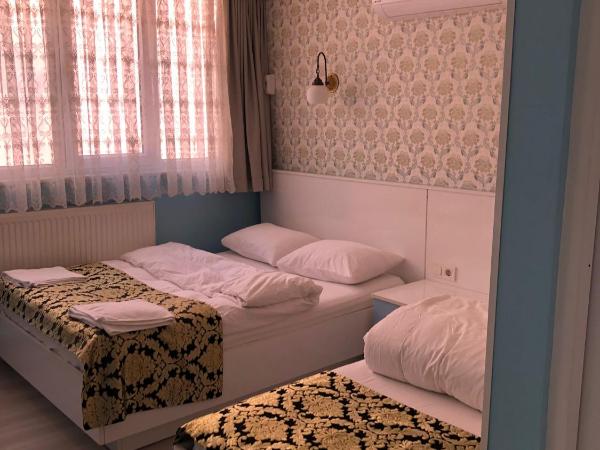 Tulip Guesthouse : photo 8 de la chambre chambre triple standard