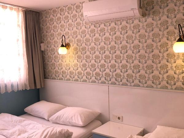 Tulip Guesthouse : photo 5 de la chambre chambre triple standard