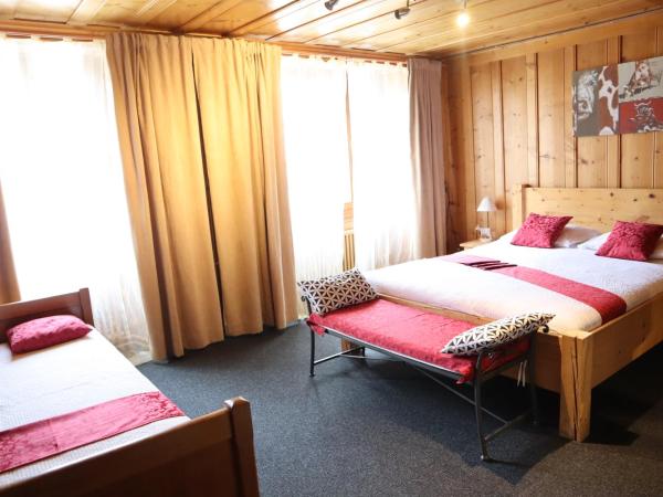 Gruyère Rooms : photo 1 de la chambre chambre double supérieure avec douche