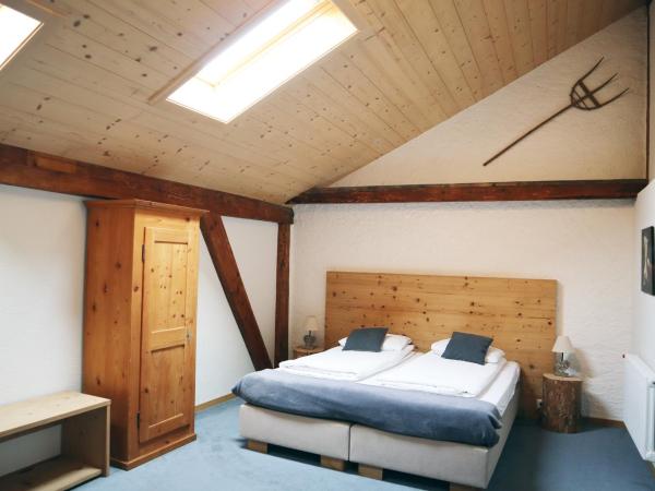Gruyère Rooms : photo 4 de la chambre chambre triple Économique avec fenêtre de toit
