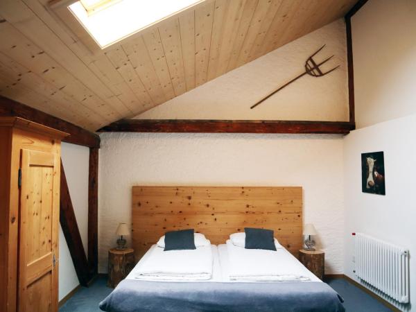 Gruyère Rooms : photo 3 de la chambre chambre triple Économique avec fenêtre de toit