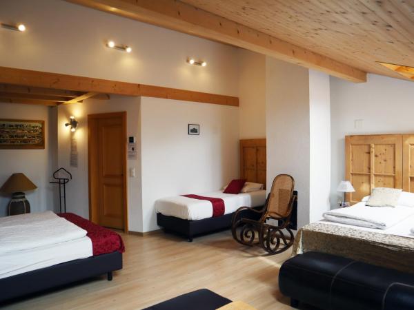 Gruyère Rooms : photo 7 de la chambre chambre quadruple