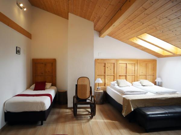 Gruyère Rooms : photo 9 de la chambre chambre quadruple