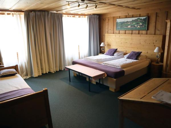 Gruyère Rooms : photo 1 de la chambre chambre double supérieure avec baignoire simple