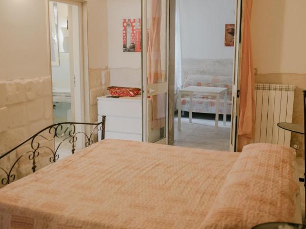 Le Camporelle In Città : photo 2 de la chambre chambre double