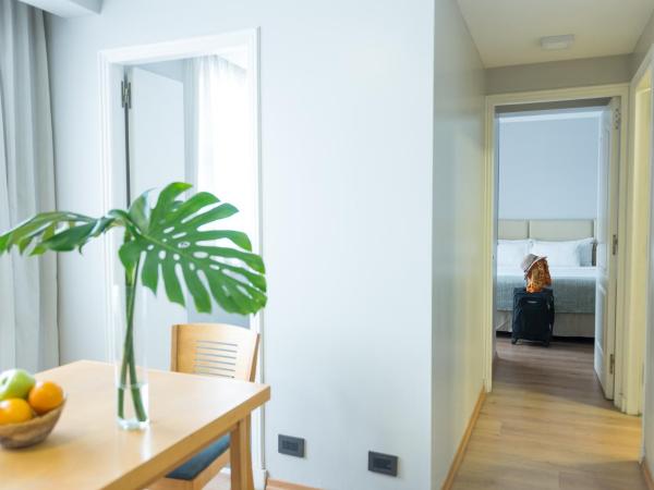 Portal Plaza Suites : photo 4 de la chambre suite