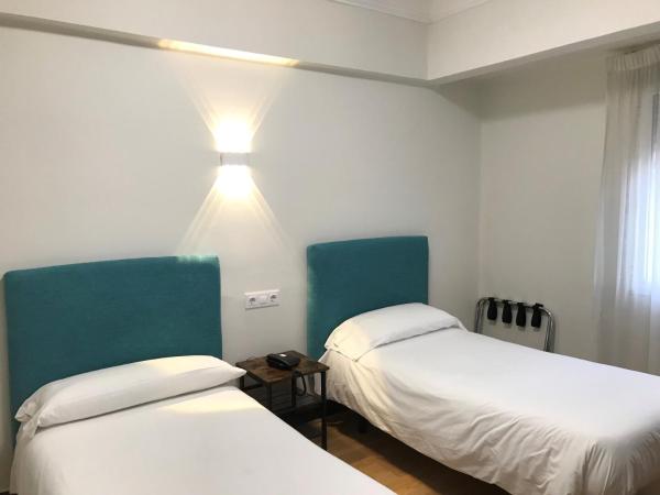 Hostal La Mexicana : photo 6 de la chambre chambre quadruple