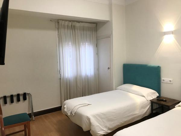 Hostal La Mexicana : photo 8 de la chambre chambre quadruple