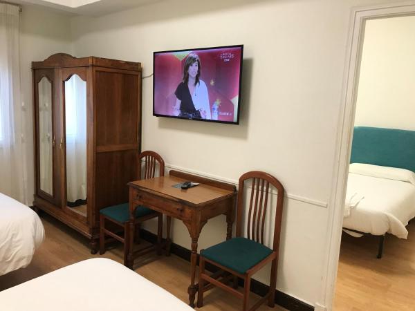 Hostal La Mexicana : photo 5 de la chambre chambre quadruple