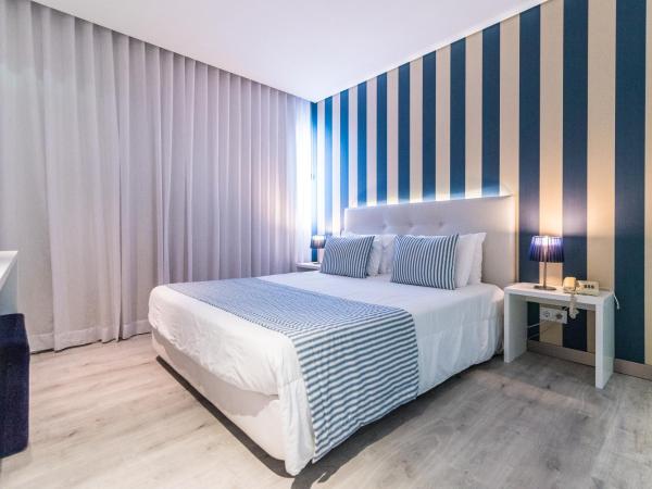 Costa de Prata Hotel : photo 5 de la chambre chambre familiale