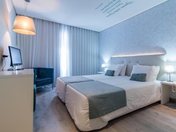 Costa de Prata Hotel : photo 1 de la chambre chambre lits jumeaux supérieure