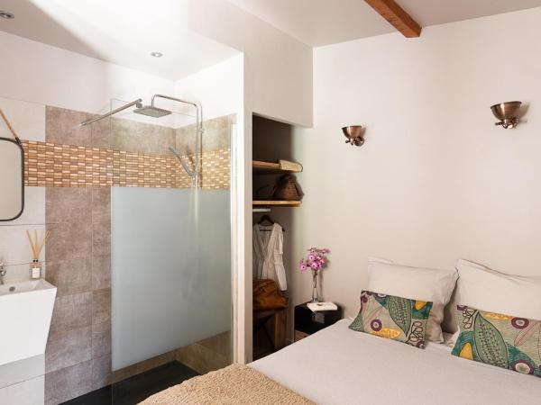 Résidence I Levri : photo 9 de la chambre appartement - vue sur jardin