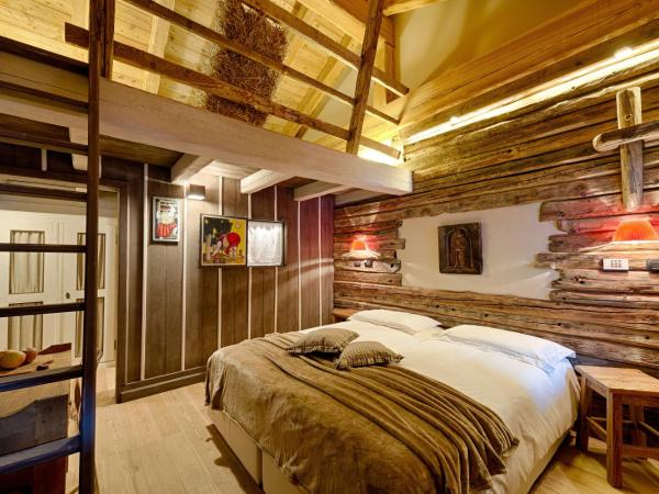 Les Plaisirs d'Antan : photo 7 de la chambre chambre double - duplex avec accès au spa