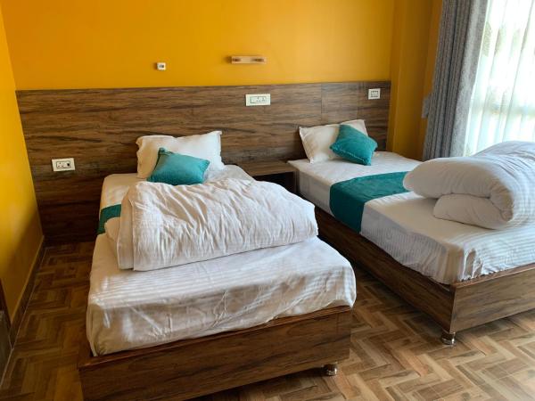 Munus Travel Home : photo 5 de la chambre chambre lits jumeaux deluxe