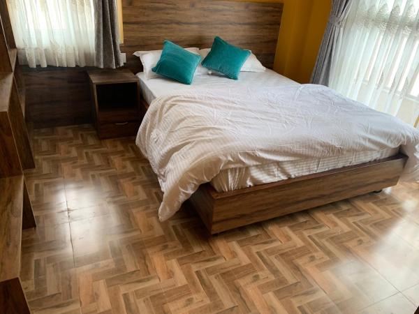 Munus Travel Home : photo 3 de la chambre chambre deluxe