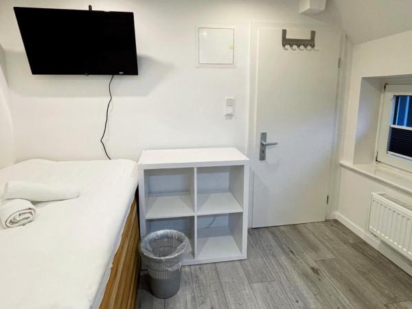 Schlafkonzept Hannover : photo 6 de la chambre chambre simple avec salle de bains 