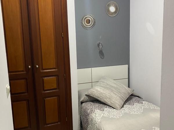 Hostal Puerta Carmona : photo 4 de la chambre chambre triple standard