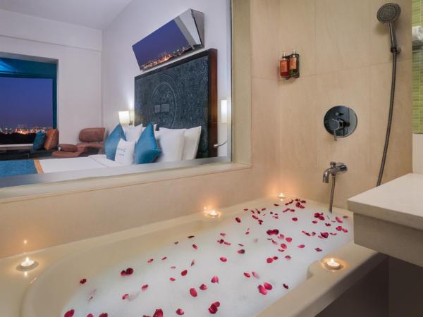 Golden Tulip Gurgaon Sector 29 : photo 4 de la chambre deluxe room 1 queen bed garden view